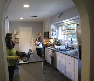 white kitchen with island view 2
