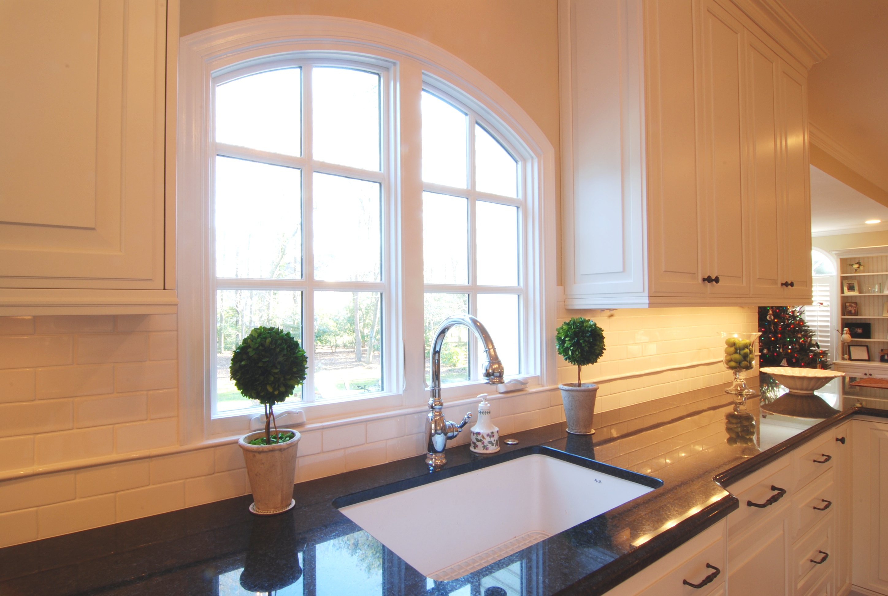 White Kitchen Photo Looking at Kitchen Sink