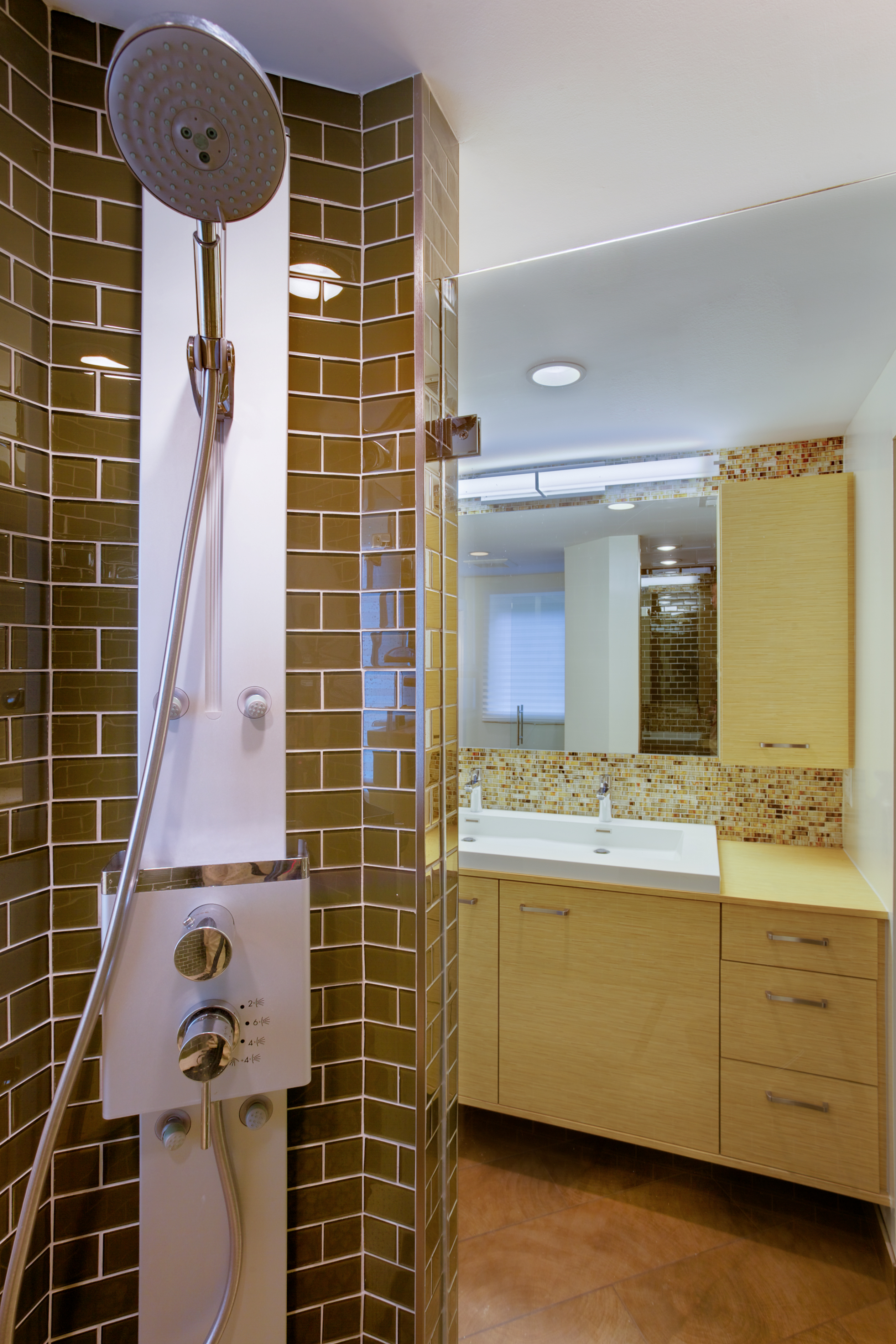 Bathroom with double vanity and yellow, wood cabinetry - view 6 - view from shower