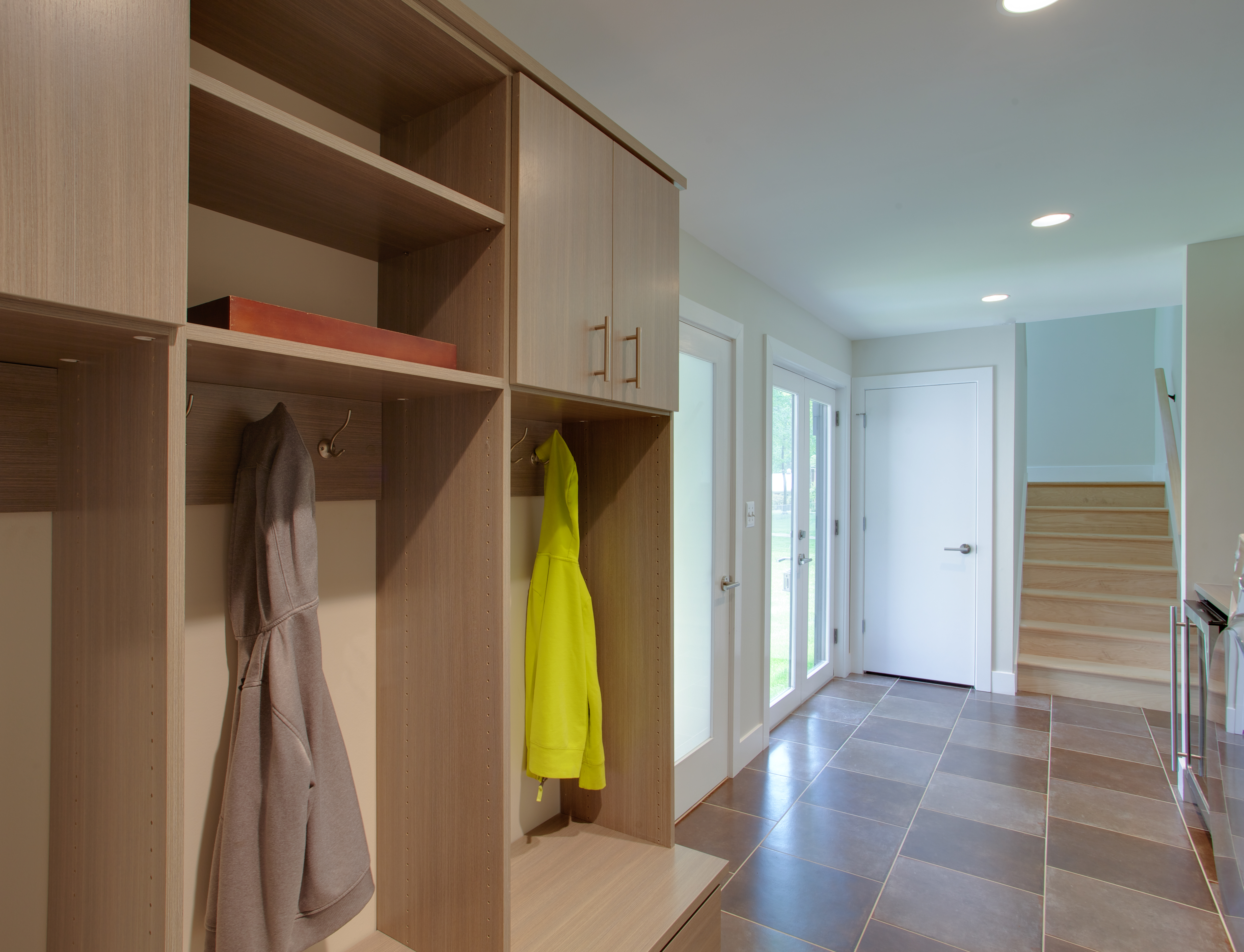 Entry area with built-in cabinetry